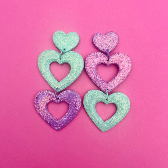 Double Heart Dangles - Aqua/Purple Glitter